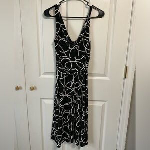 Maggie London dress. Black and white. Midi length. Size 4